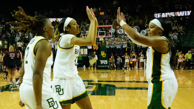 Nov 14, 2023; Waco, Texas, USA; Baylor Lady Bears guard Sarah Andrews (24) guard Darianna Littlepage-Buggs (5) and guard Yaya Felder (2) celebrate after defeating the Utah Utes at Ferrell Center. Mandatory Credit: Chris Jones-USA TODAY Sports  